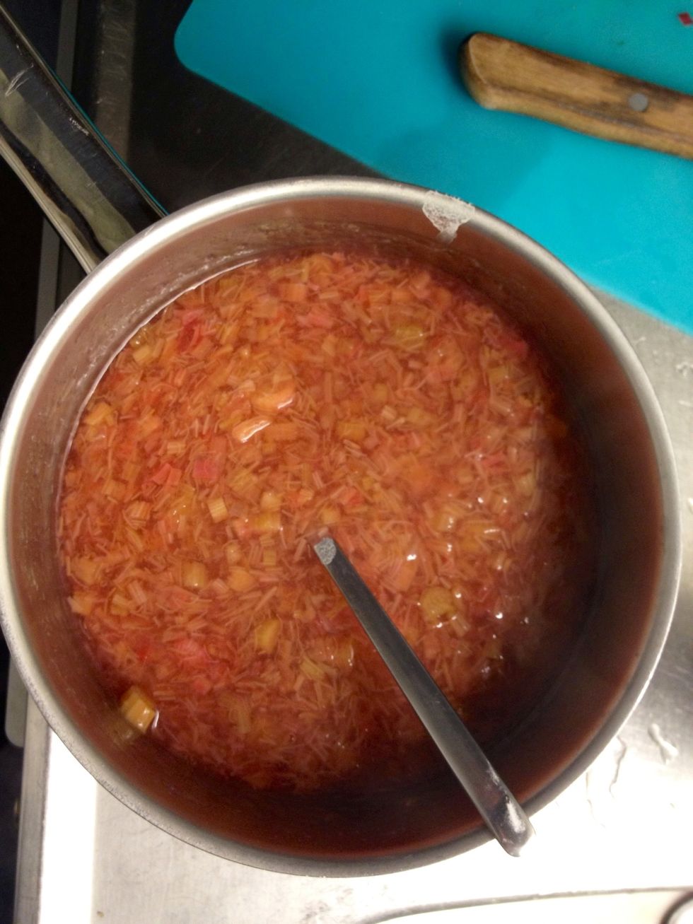 Pour the flour mix into the rhubarb pan. Stir while adding the mix, making sure there are no flour lumps. Allow the rhubarbs to come to a boil and then remove the pan from the stove.