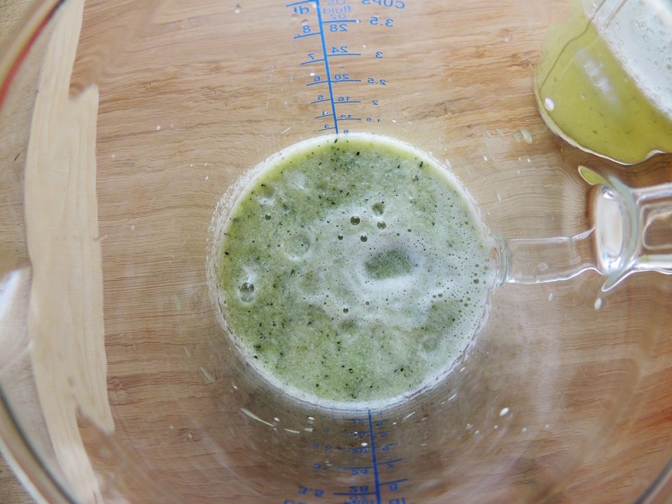Pour the frothy liquid into the measuring cup and add water to fill to the amount your tray holds. You may want to stir or blend again at this point.