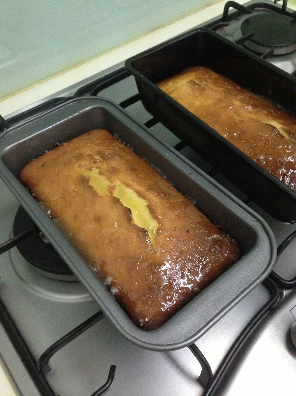 Pour the glaze over the lemon cake when hot