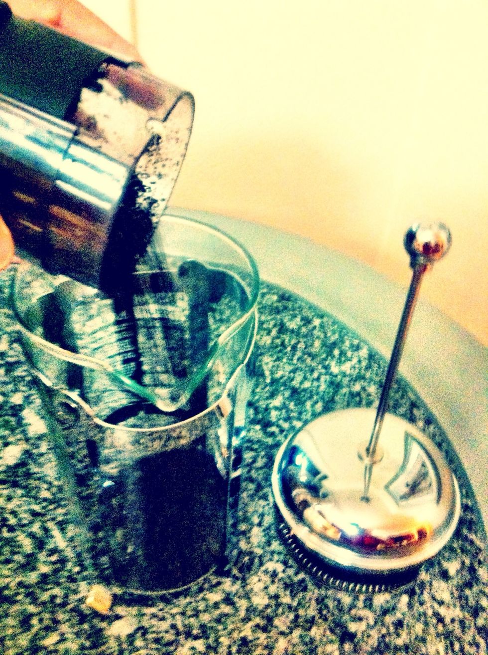 Pour the ground coffee into the glass beaker!