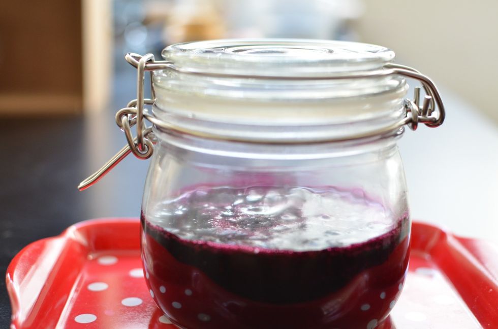 Pour the jam into the sanitized jars.