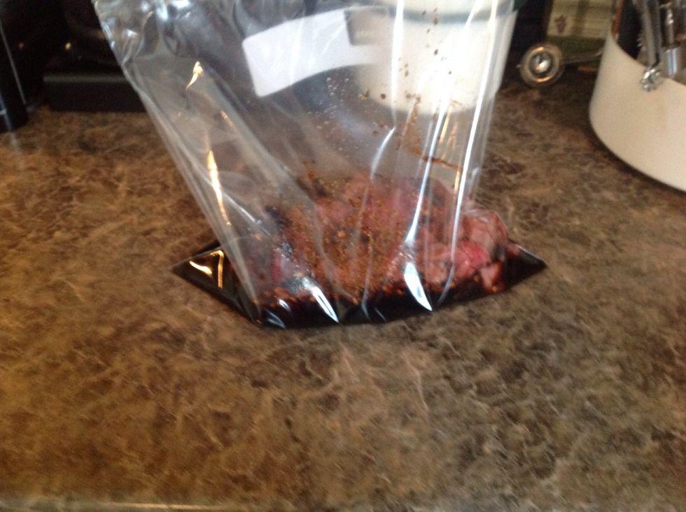 Pour the marinade into the ziplock bag too.