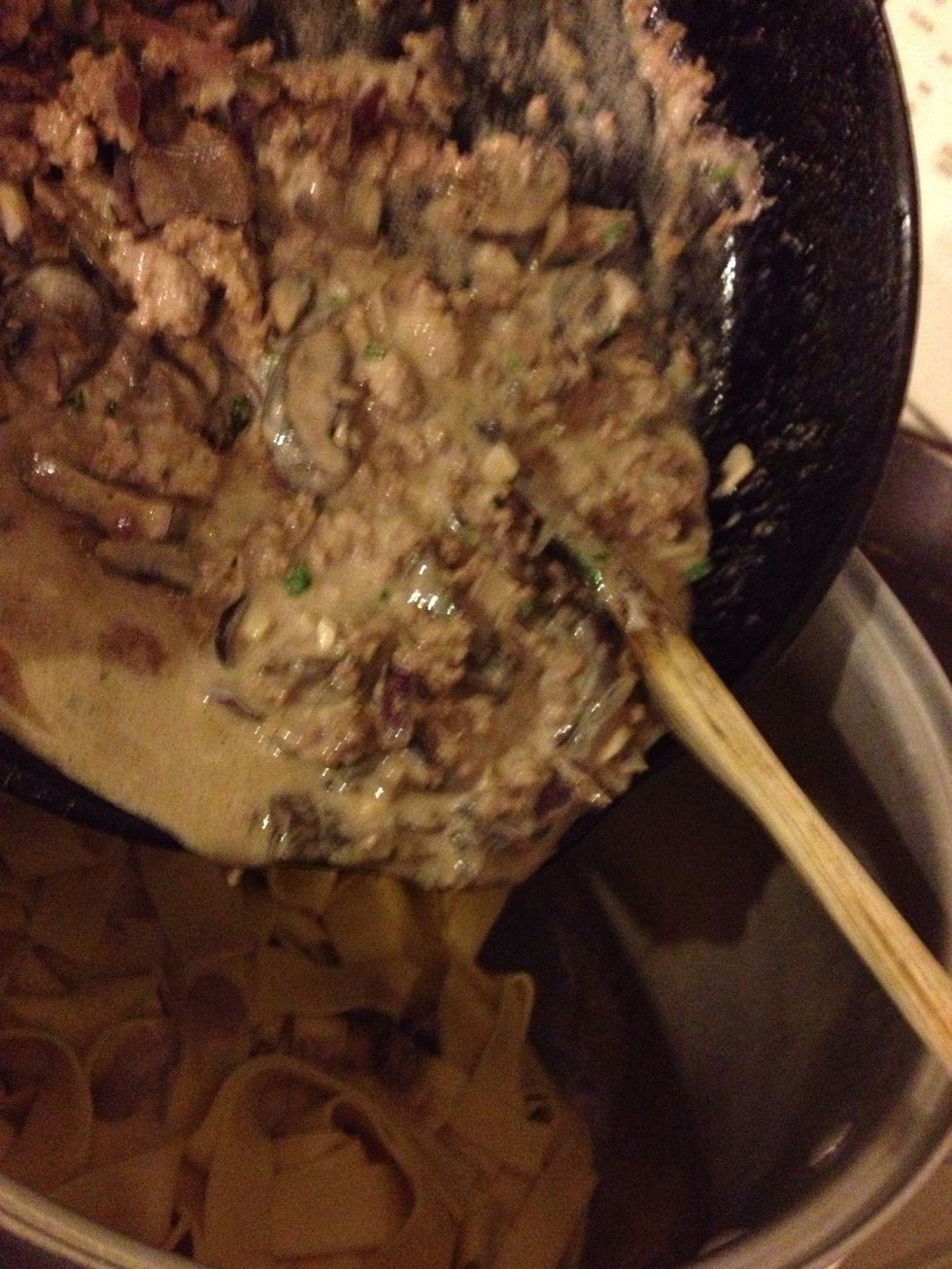 Pour the meat mixture over the noodles.