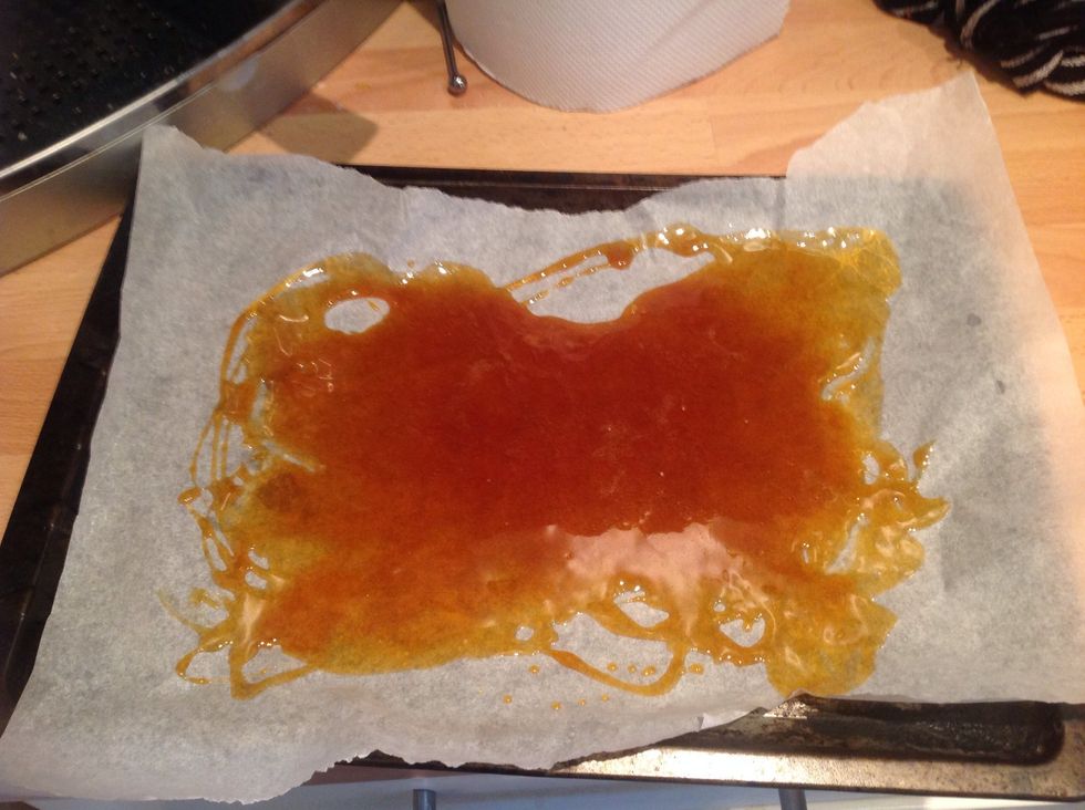 Pour the melted sugar onto a baking tray lined with baking paper and leave to cool and harden