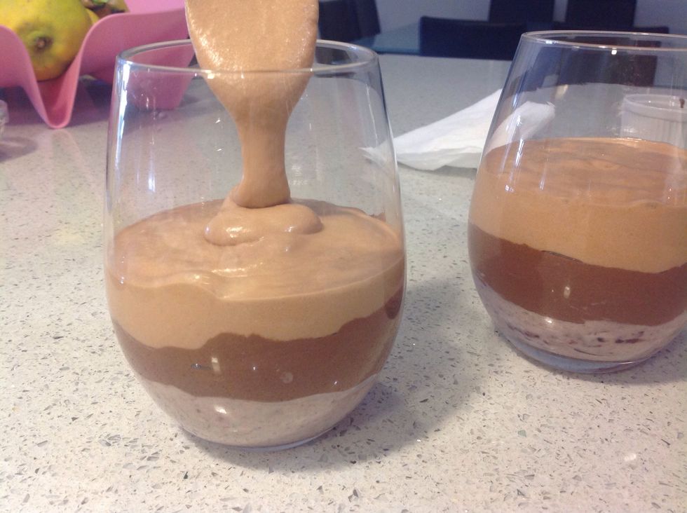 Pour the milk chocolate mixture on top of the dark chocolate layer and refrigerate the dessert for at least 3 hours.