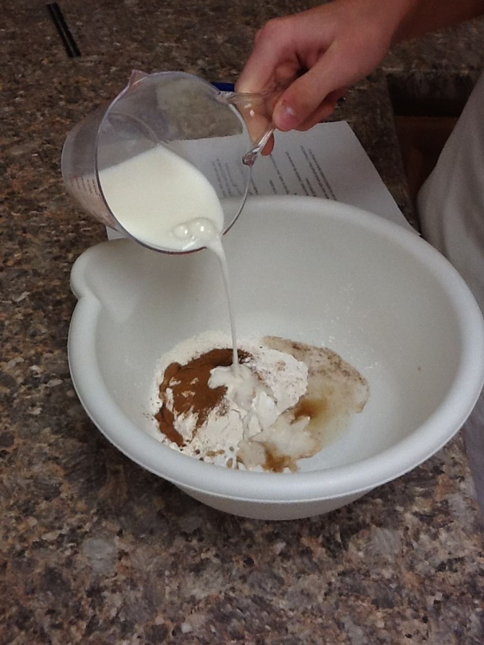 Pour the milk into the bowl.