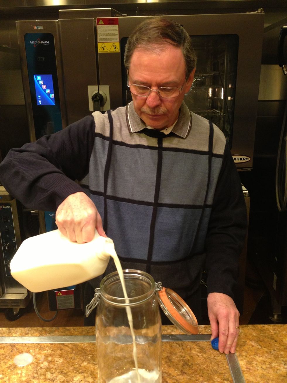 Pour the milk into your sanitized jar.