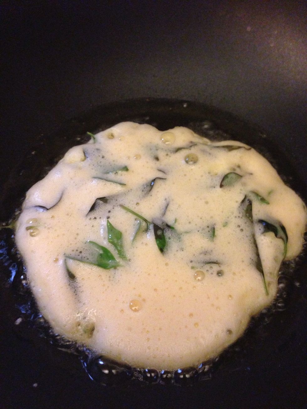 Pour the mixed egg in the heated oil. Wait for 1-2mins