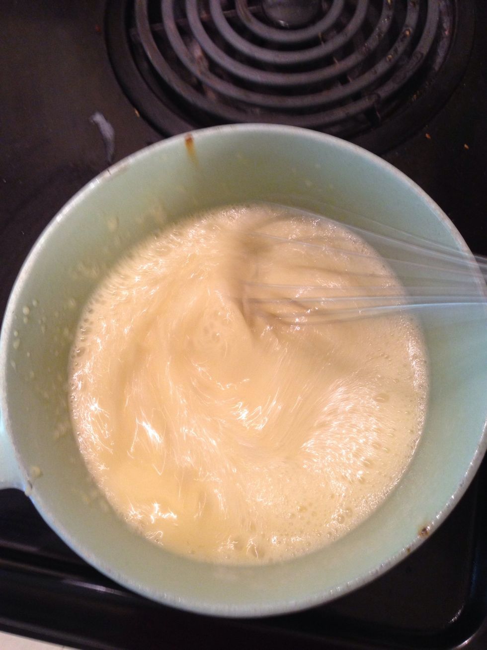 Pour the mixture back into saucepan and cook over medium-low heat. Whisk vigorously until it comes to a boil and the whisk leaves a trail in the pastry cream (about 6-8 minutes).
