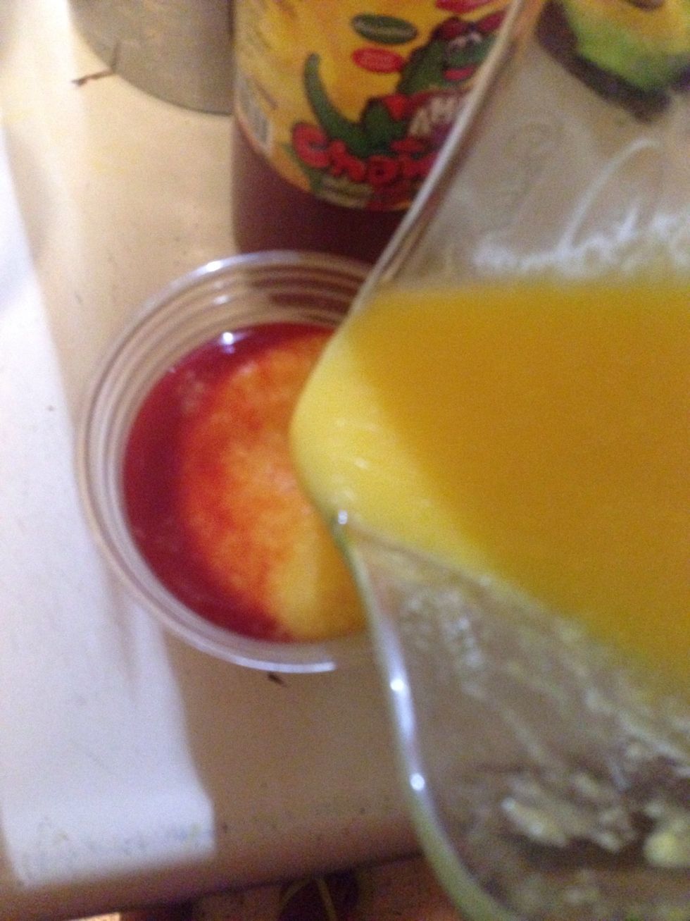 Pour the mixture into 3/4 of the cup. Add more chili to the top if desired.