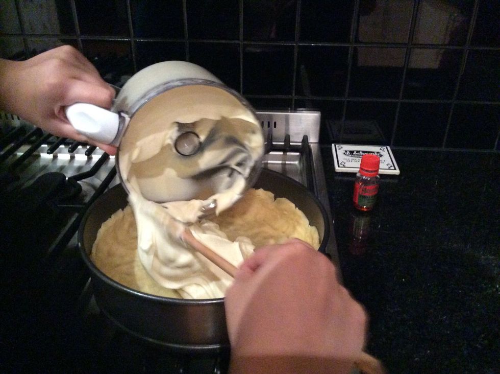 Pour the mixture into the base