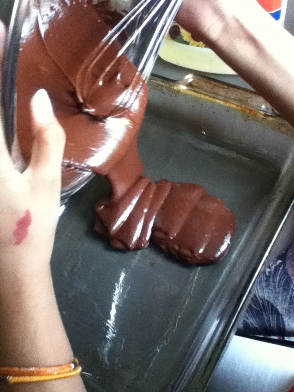 Pour the mixture onto a tray thingy. And make sure you use up the whole tray! :)