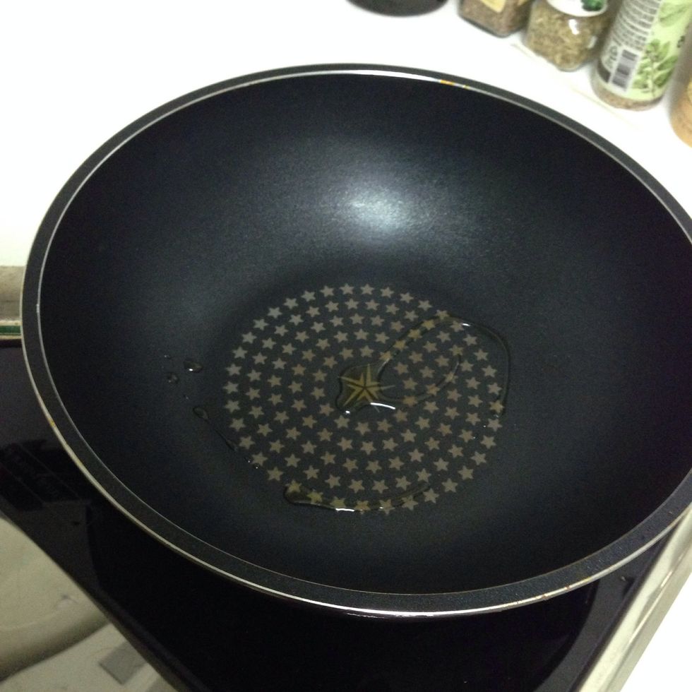 Pour the olive oil into heated pan