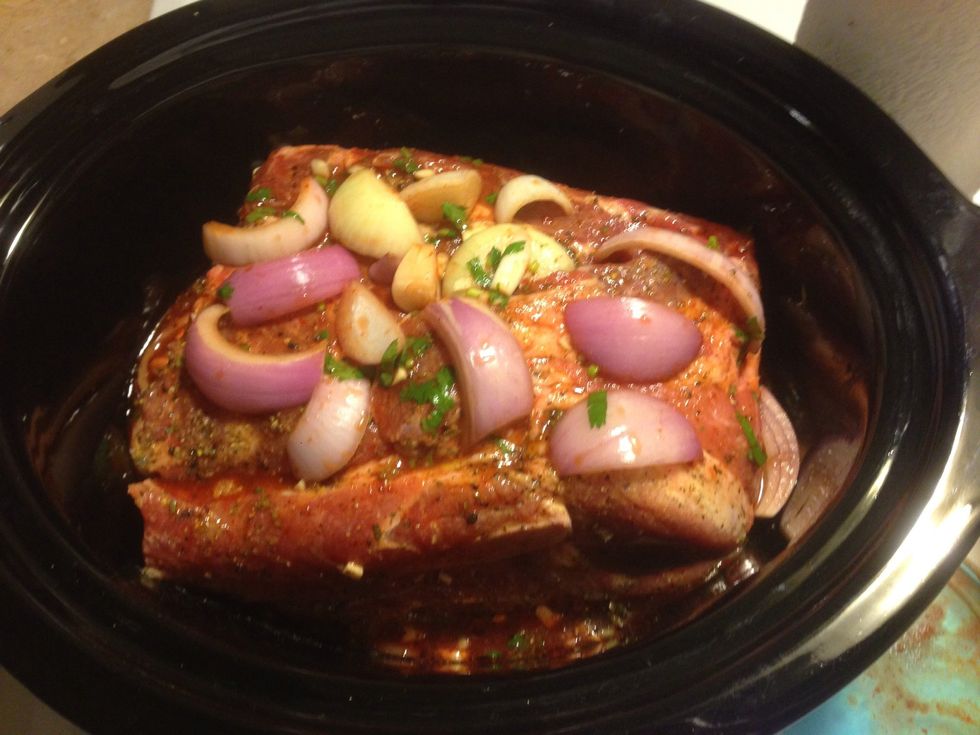Pour the onion mixture and a bit more enchilada sauce on top.