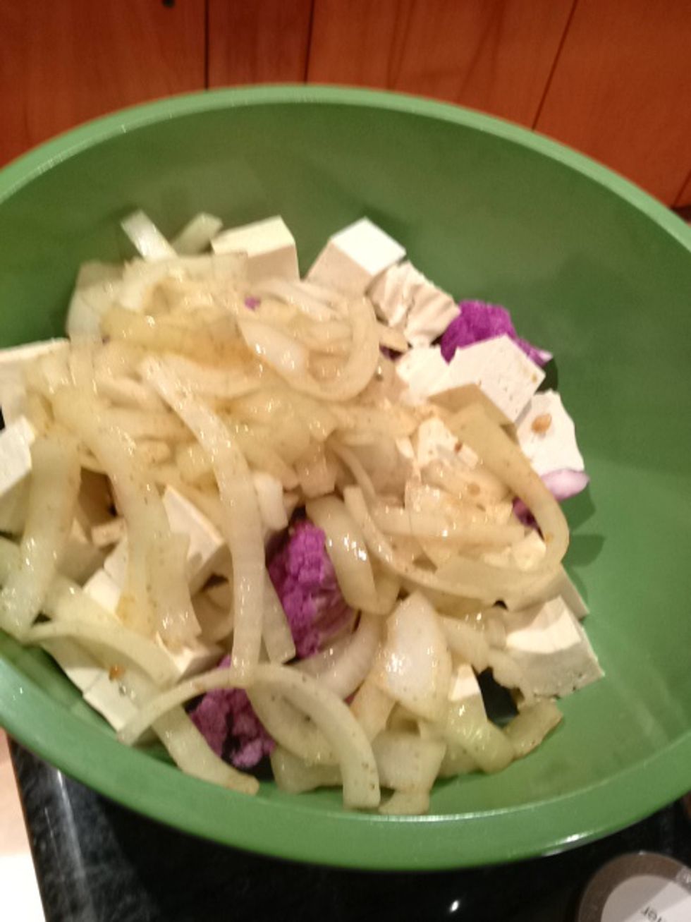 Pour the onion mixture into the bowl. You might need to add a bit of olive oil to get everything mixed sufficiently.