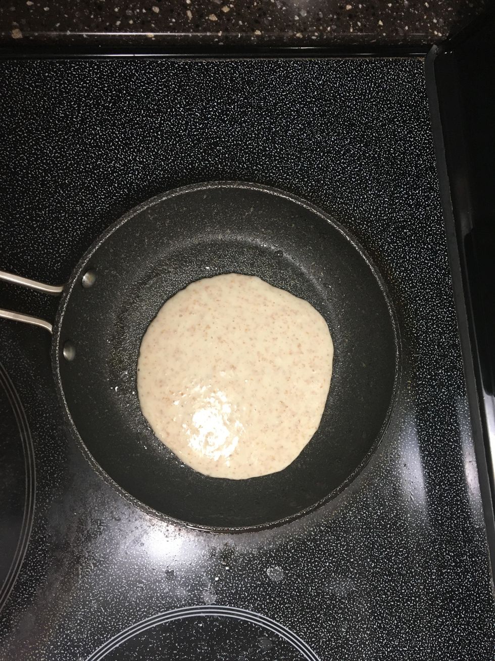 Pour the pancake mixture into the skillet or griddle