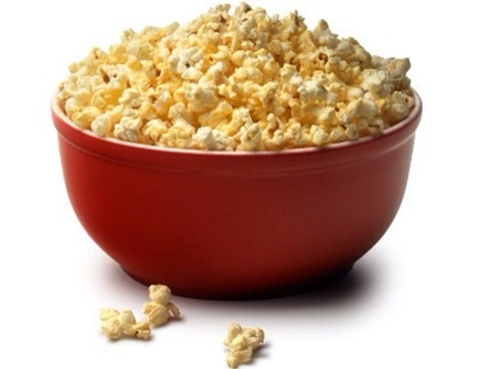 Pour the popcorn into the a bowl.