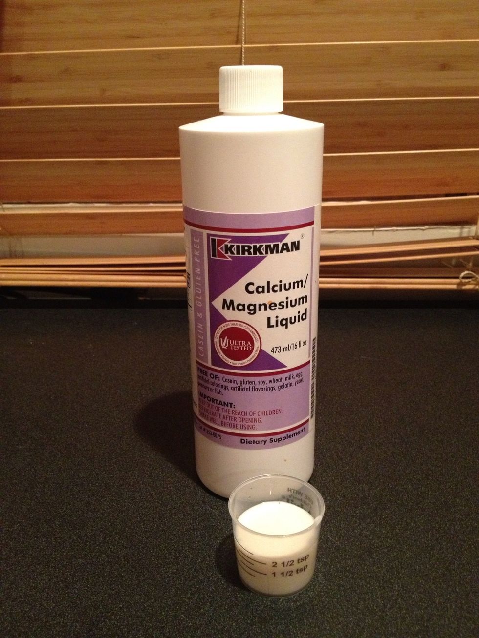 Pour the prescribed amount of medication.