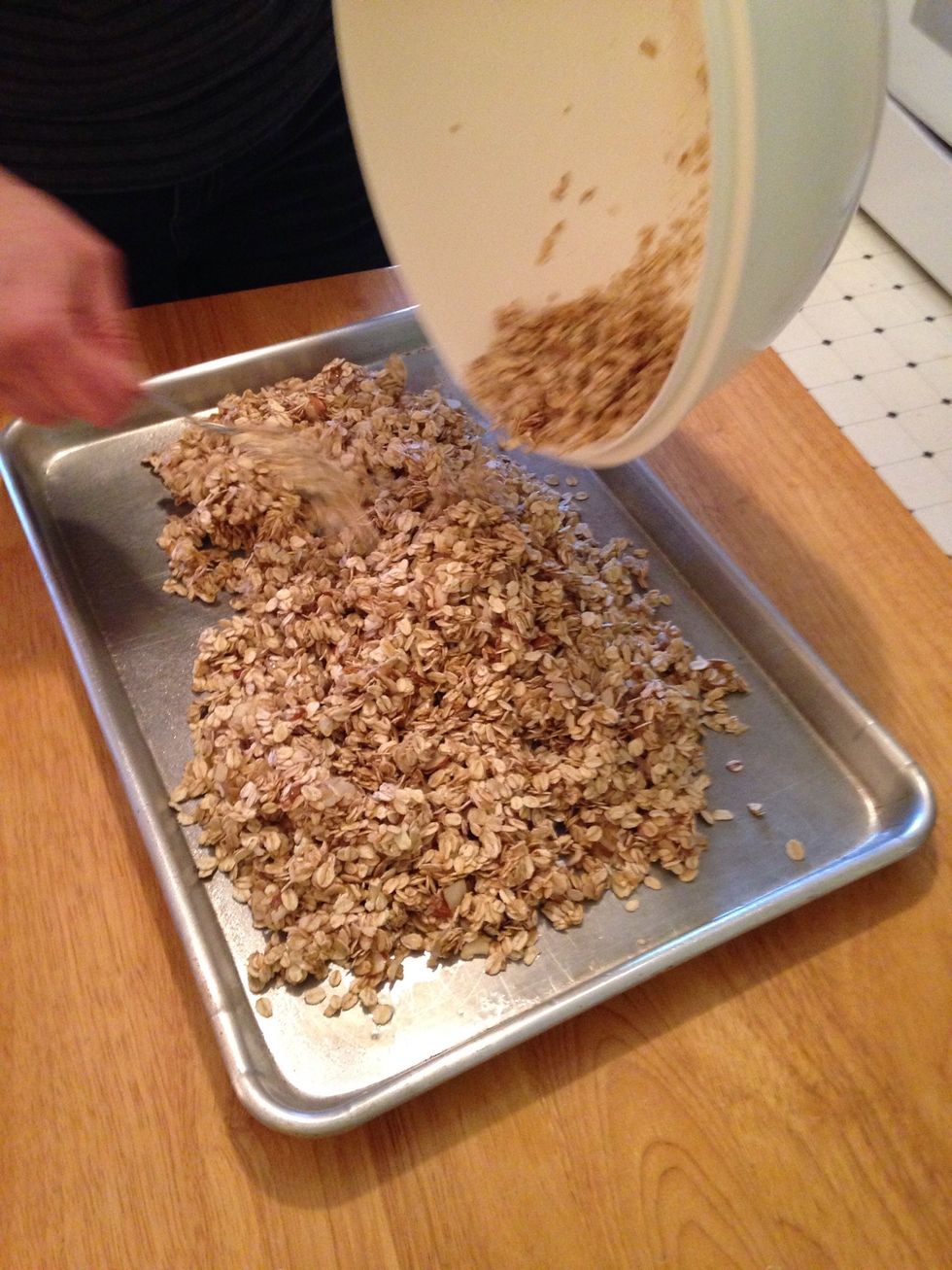 Pour the product and spread it out on a large cookie sheet.