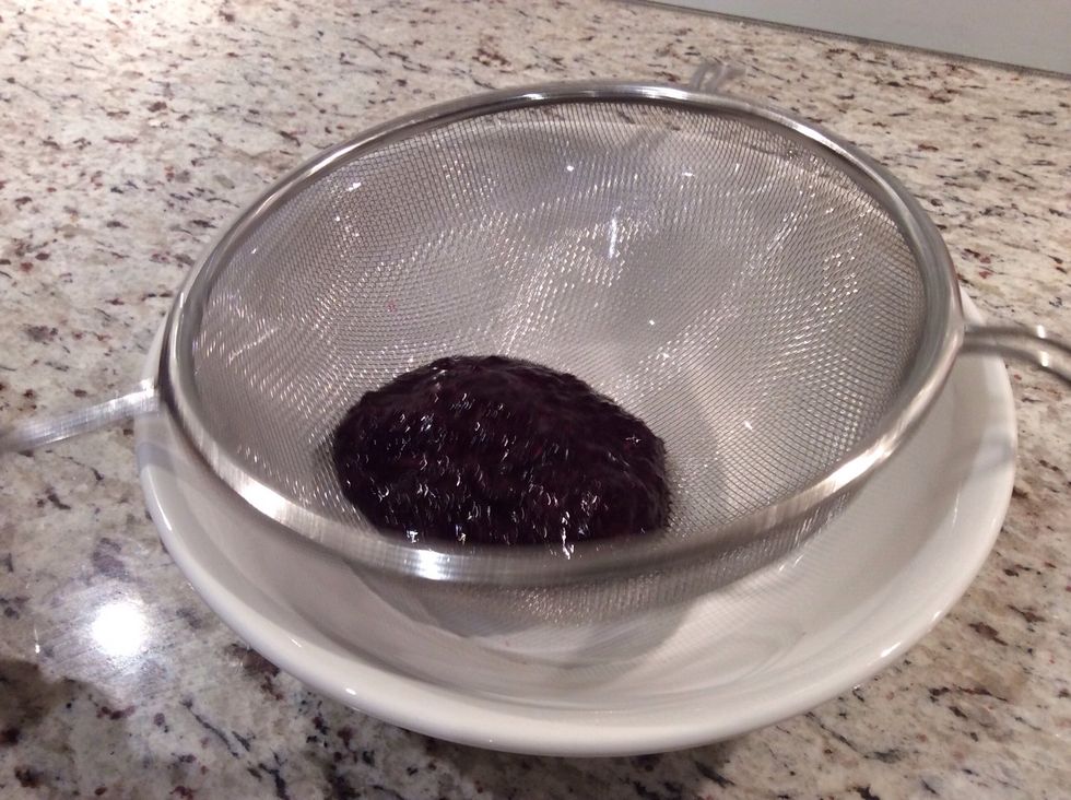 Pour the puree through a sieve to remove the skin (1 minute)