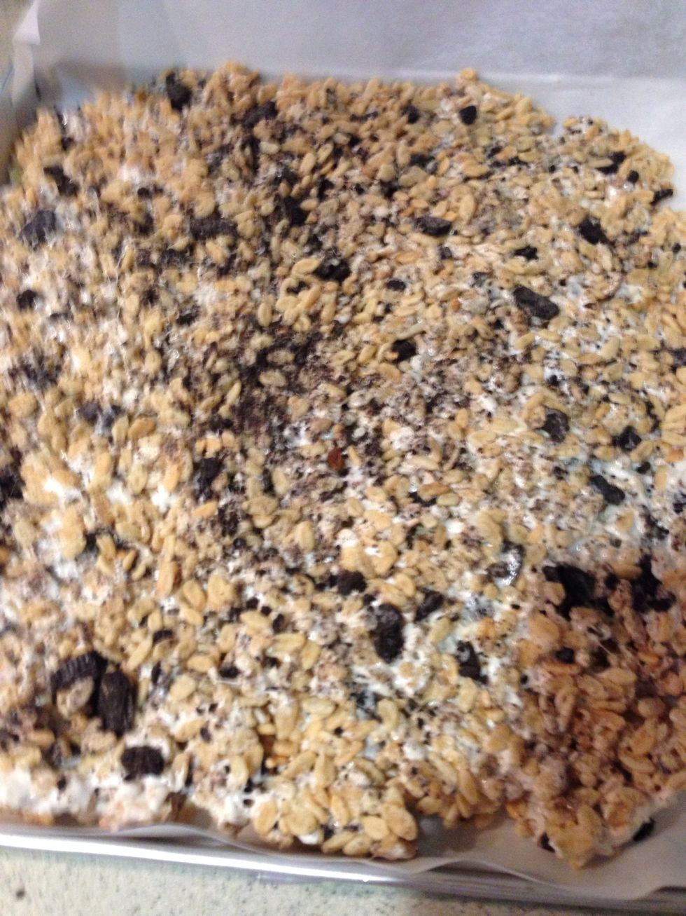 Pour the Rice Krispie mixture to the pan (i used parchment paper). Press it down and allow to cool completely before cutting it.