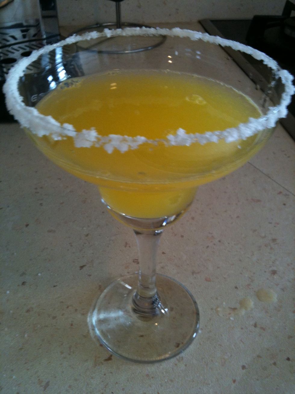 Pour the shaked margarita into the glass and Enjoy your margarita