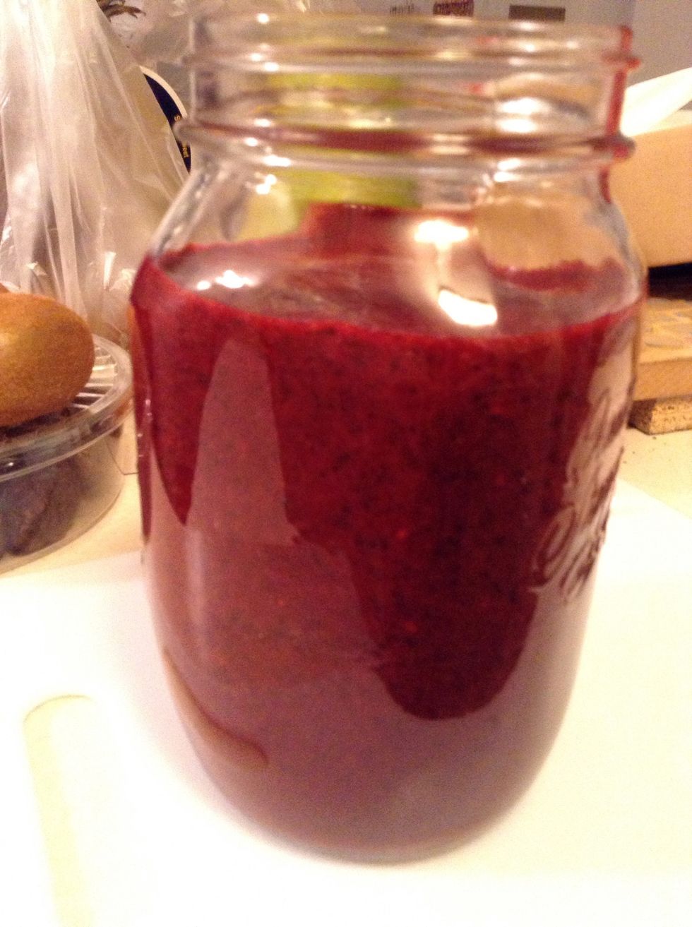 Pour the smoothie into a 32 ounce jar. You can drink as is and enjoy a delicious smoothie or you can make flavored water out of it. (See next step)
