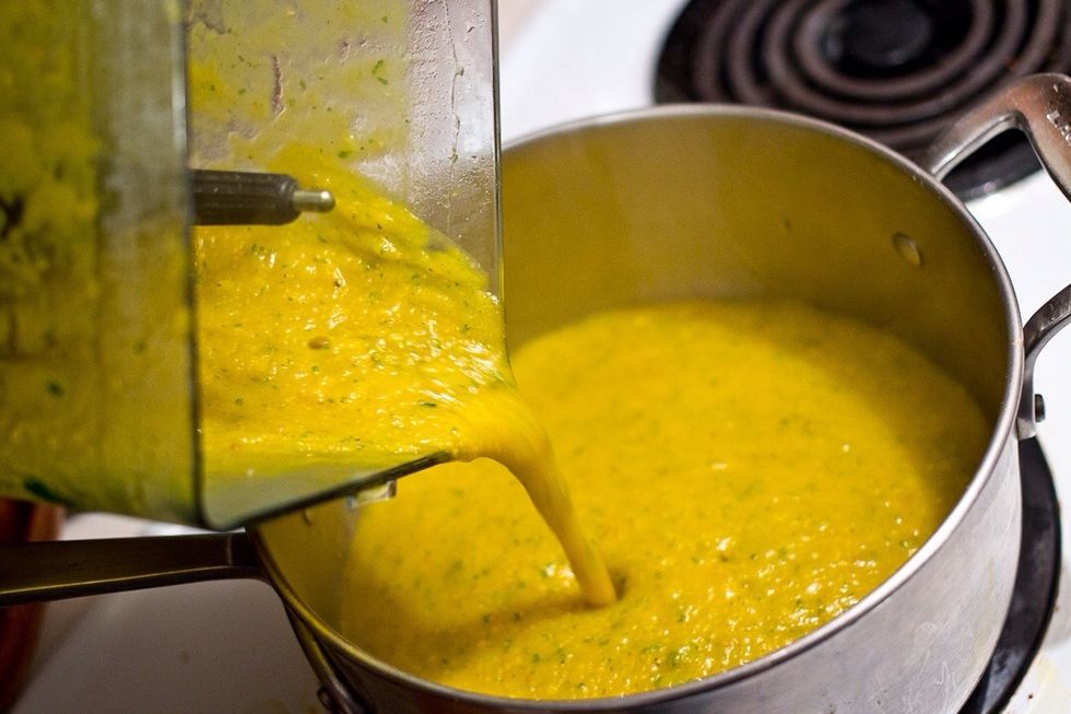 Pour the soup back into a pot for seasoning.