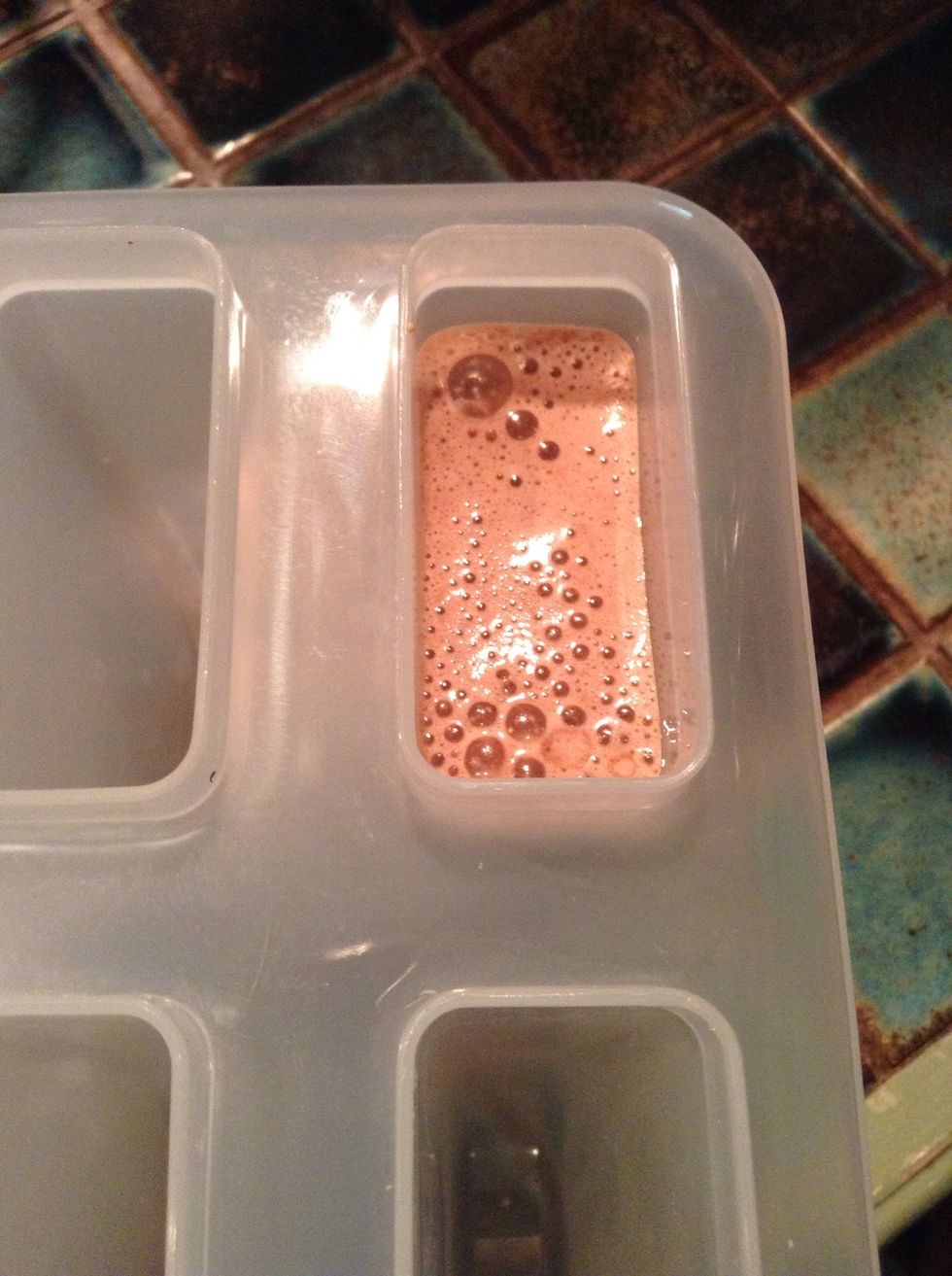 Pour the substance in to your Popsicle molds.