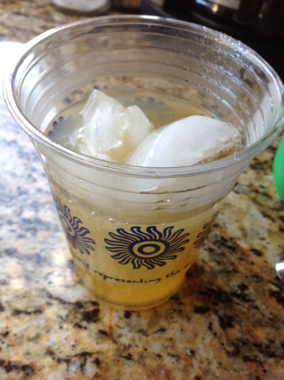 Pour the tea into the glass.