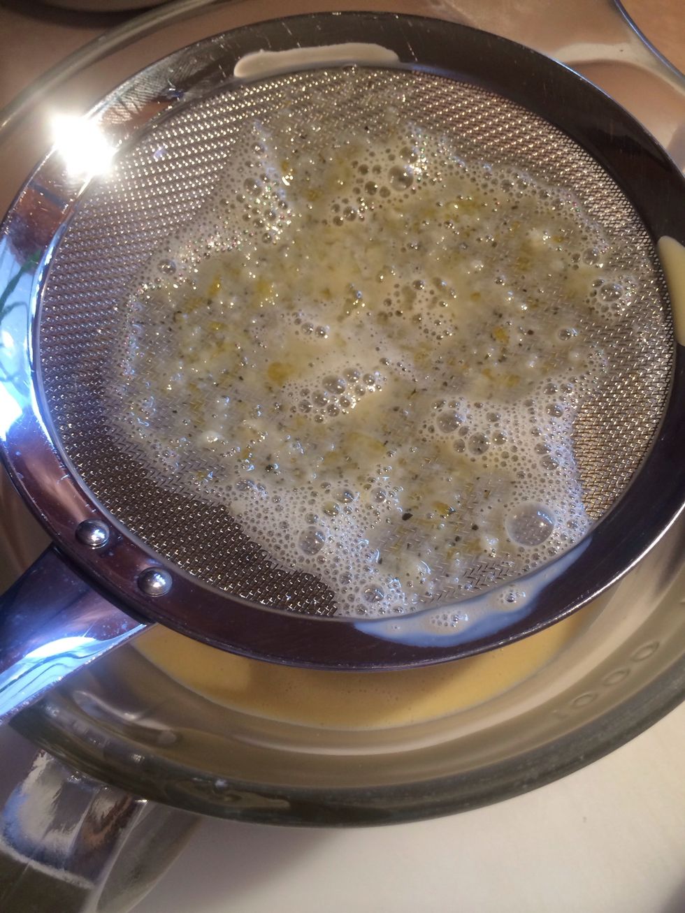 Pour the total egg mixture through a fine mesh sieve. This is another important step. This removes unwanted tea leaves, undissolved sugar and those little bits of egg that never get whisked away!