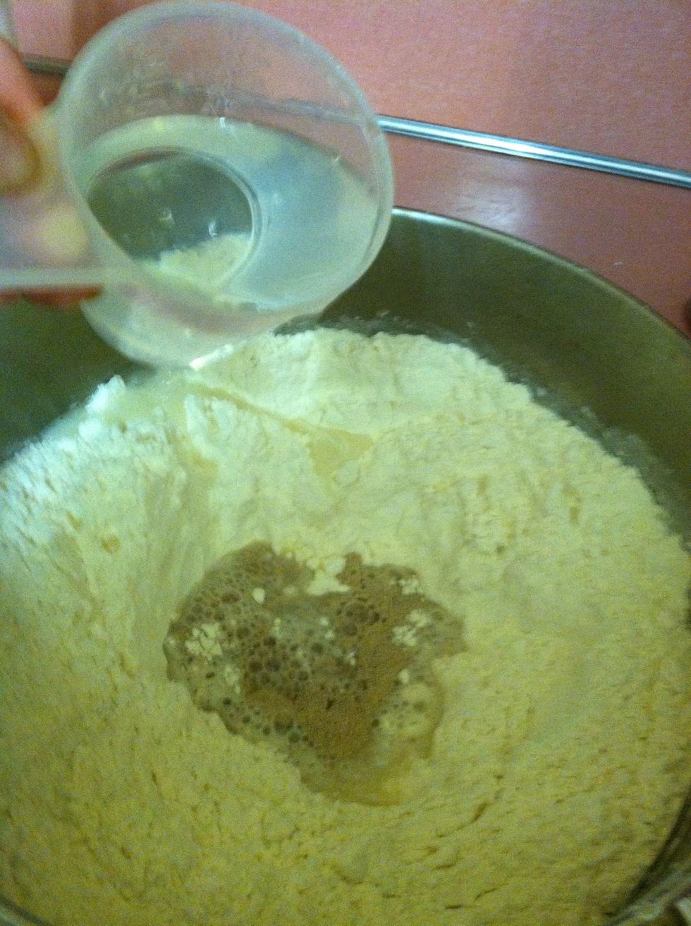 Pour the warm water on top of the yeast