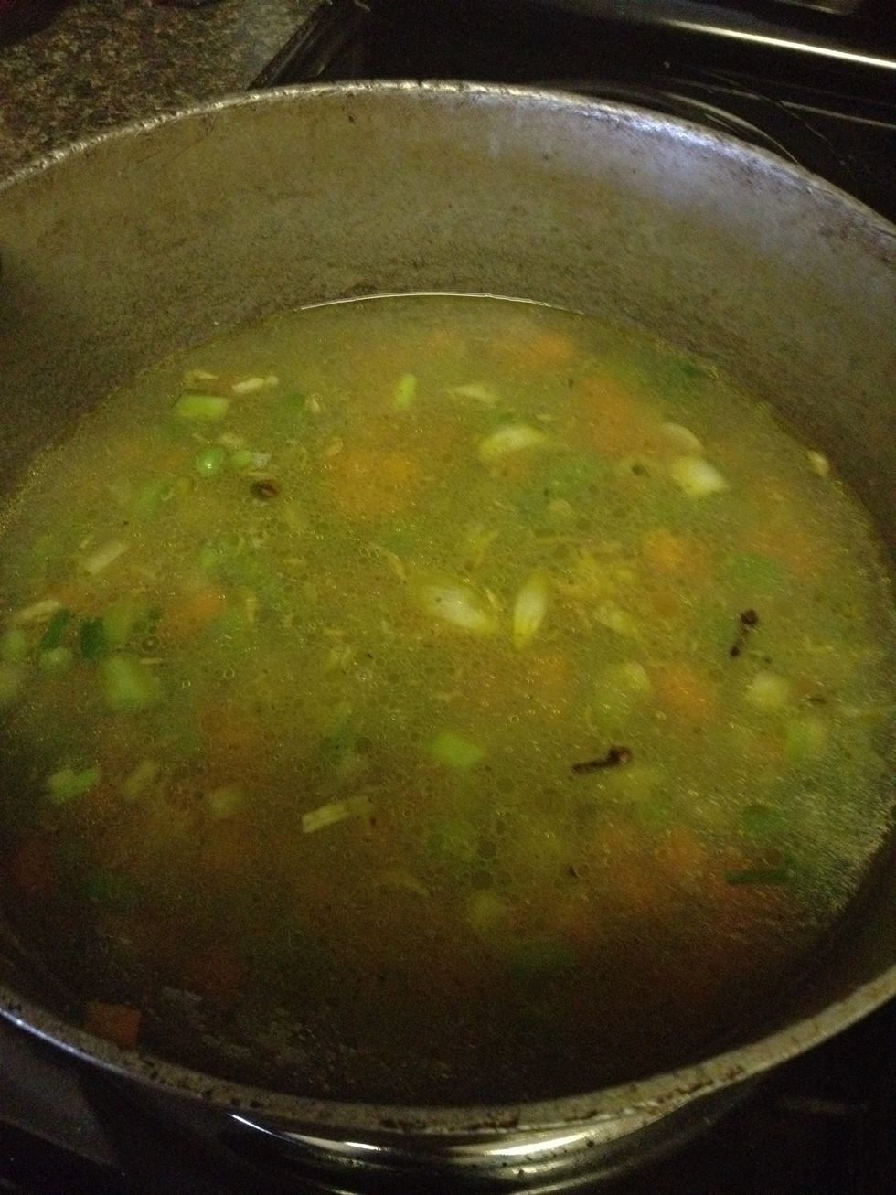 Pour the water and add the girofle and another bouilon cube