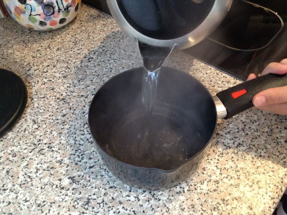Pour the water into a pan