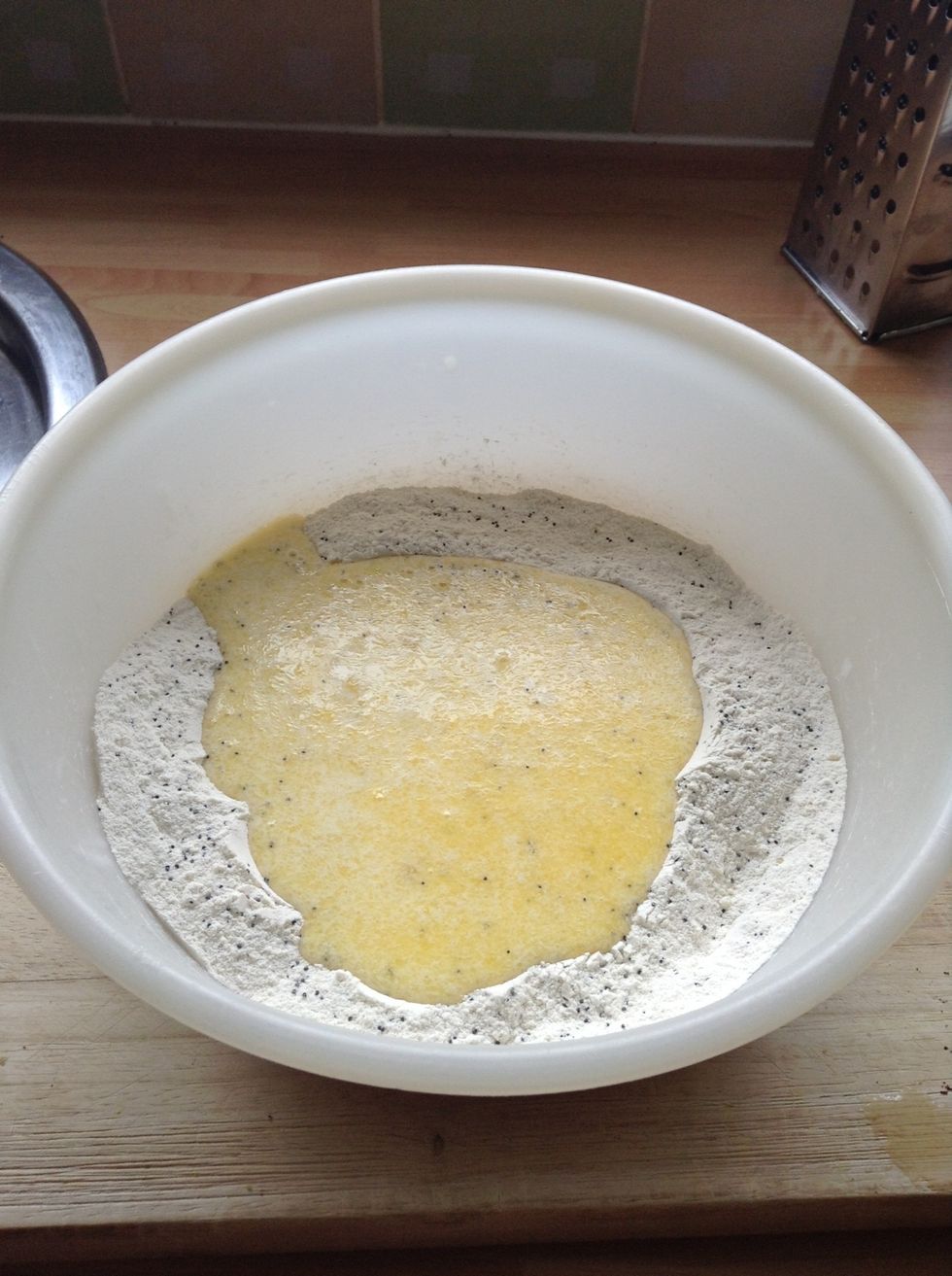 Pour the wet mix into the well of the dry mixture