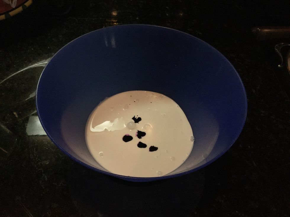Pour the whole bottle of glue and in a medium size bowl. Add in a few drops of food coloring (optional).