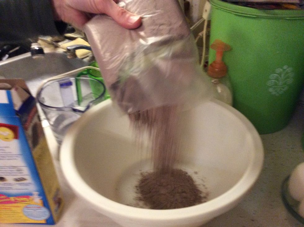 Pour the whole box of cake mix in mixing bowl