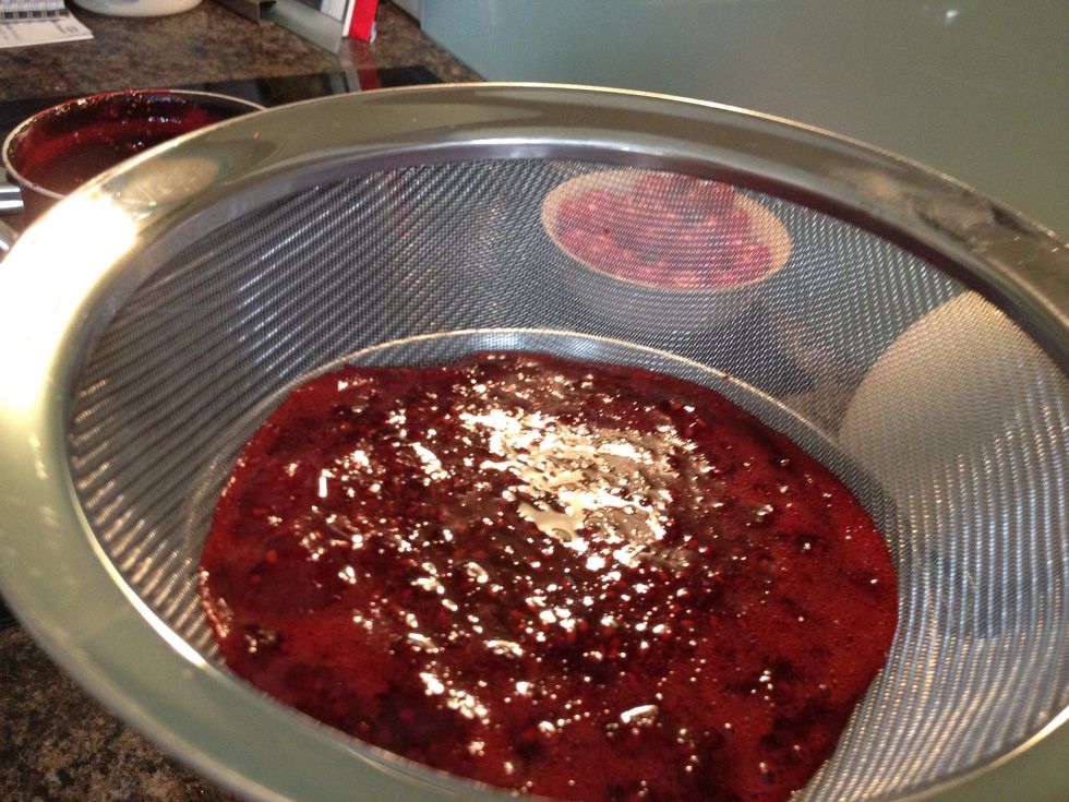Pour through a sieve into jam jars and put lids on to cool.