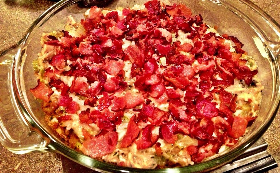 Pour turkey mixture into the stuffing crust. If you had enough mashed potatoes, make a layer of those first, then turkey mixture, then bacon.