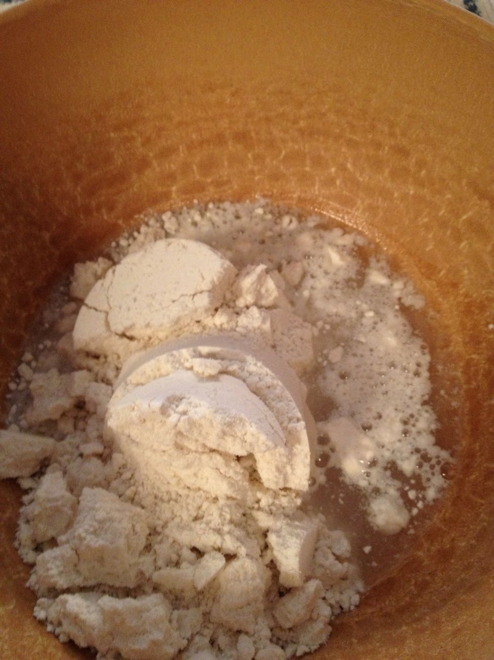 Pour water in bowl with flour mix