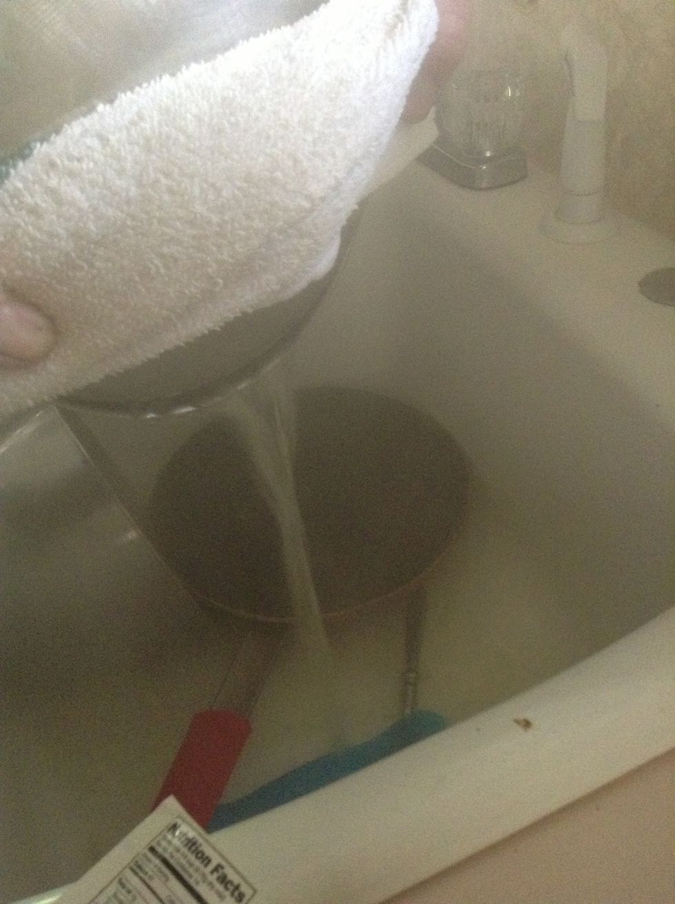 Pour water out of pot