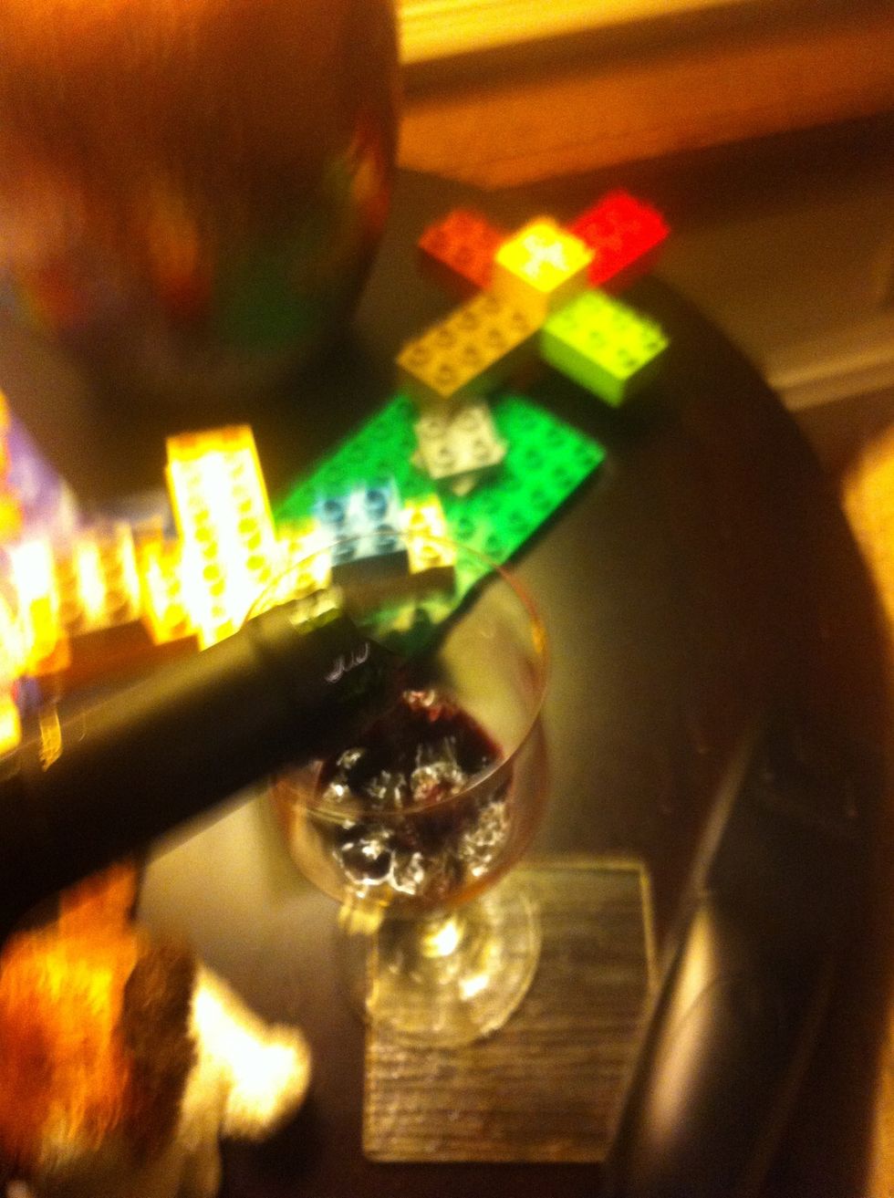 Pour with a dramatic, well aimed torrent into the glass. Seriously, its taken this long to get a freaking drink so abandon all candor and drill that glassware with grape, man!