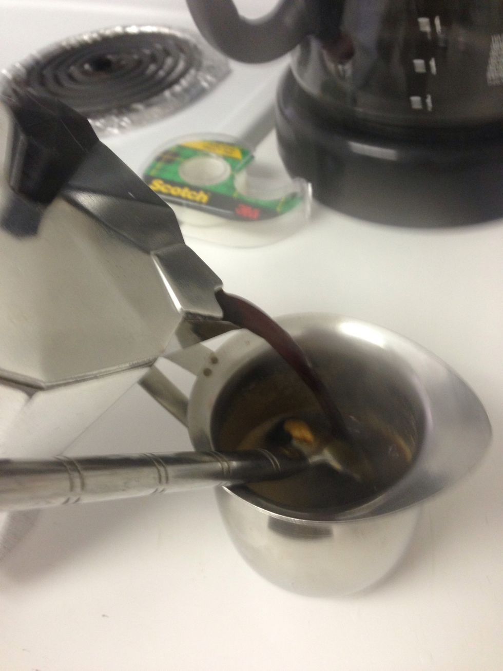 Pour your coffee into the sugar paste and stir.