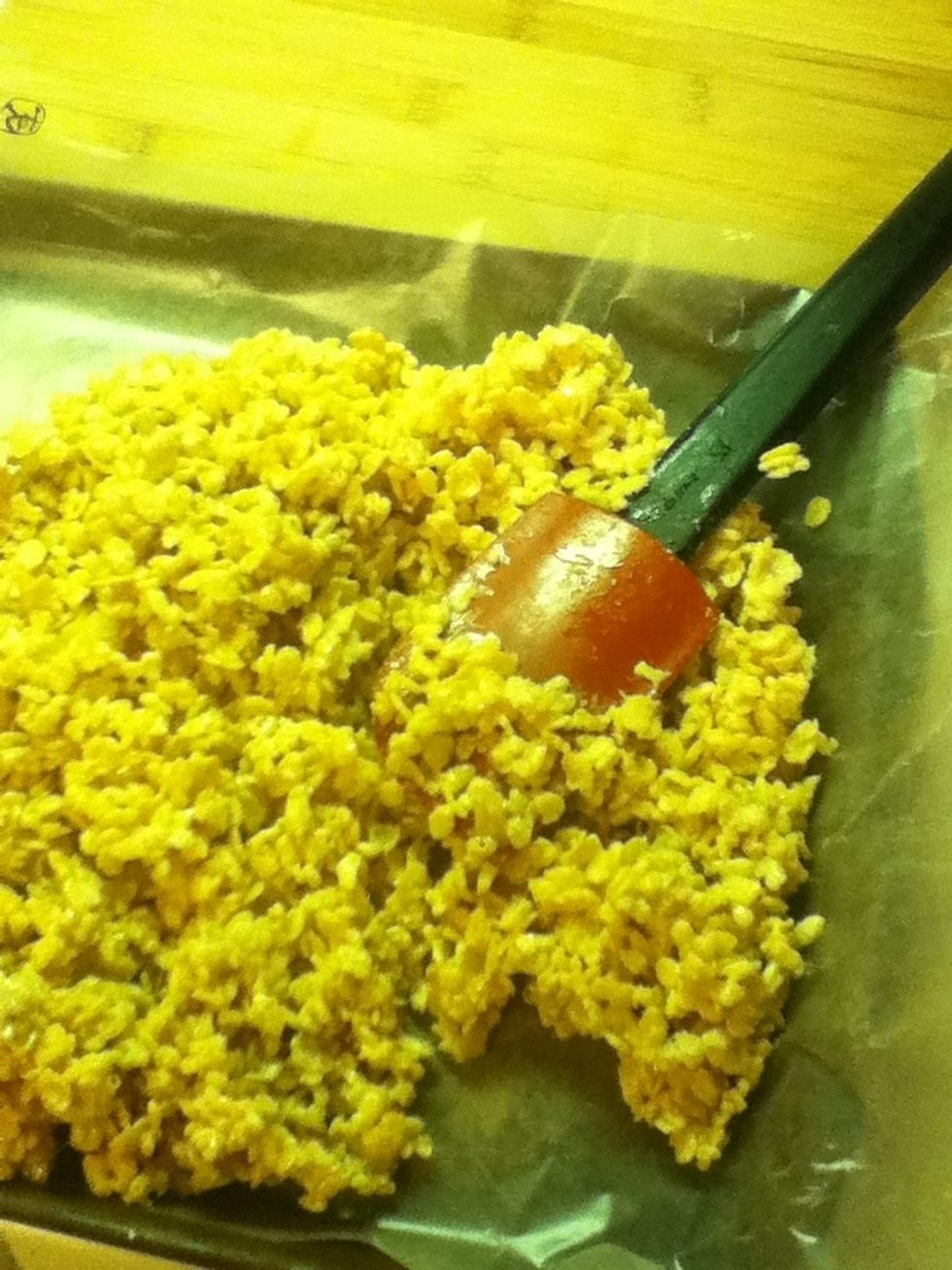 Pour your Crispies in and cover the entire sheet evenly.