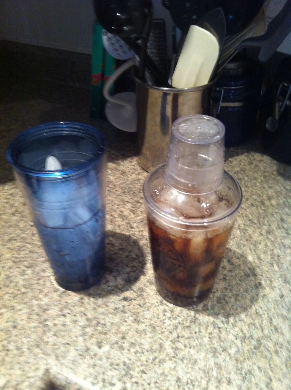 Pour your hot coffee in your shaking cup, put a lid on it and shake it.