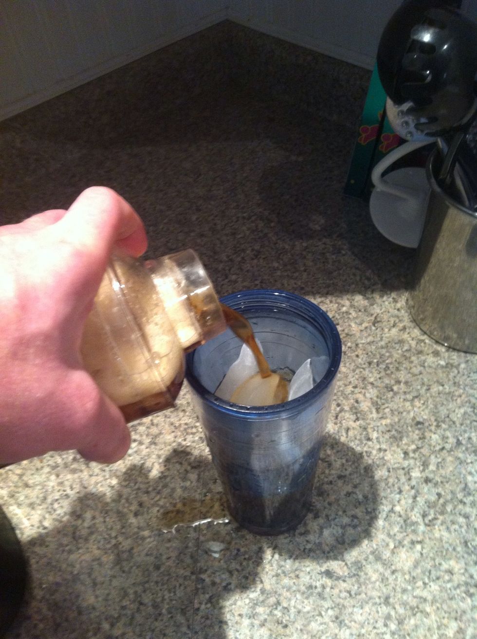 Pour your now cold coffee into another cup filled with ice. Put your milk and sugar in and enjoy.