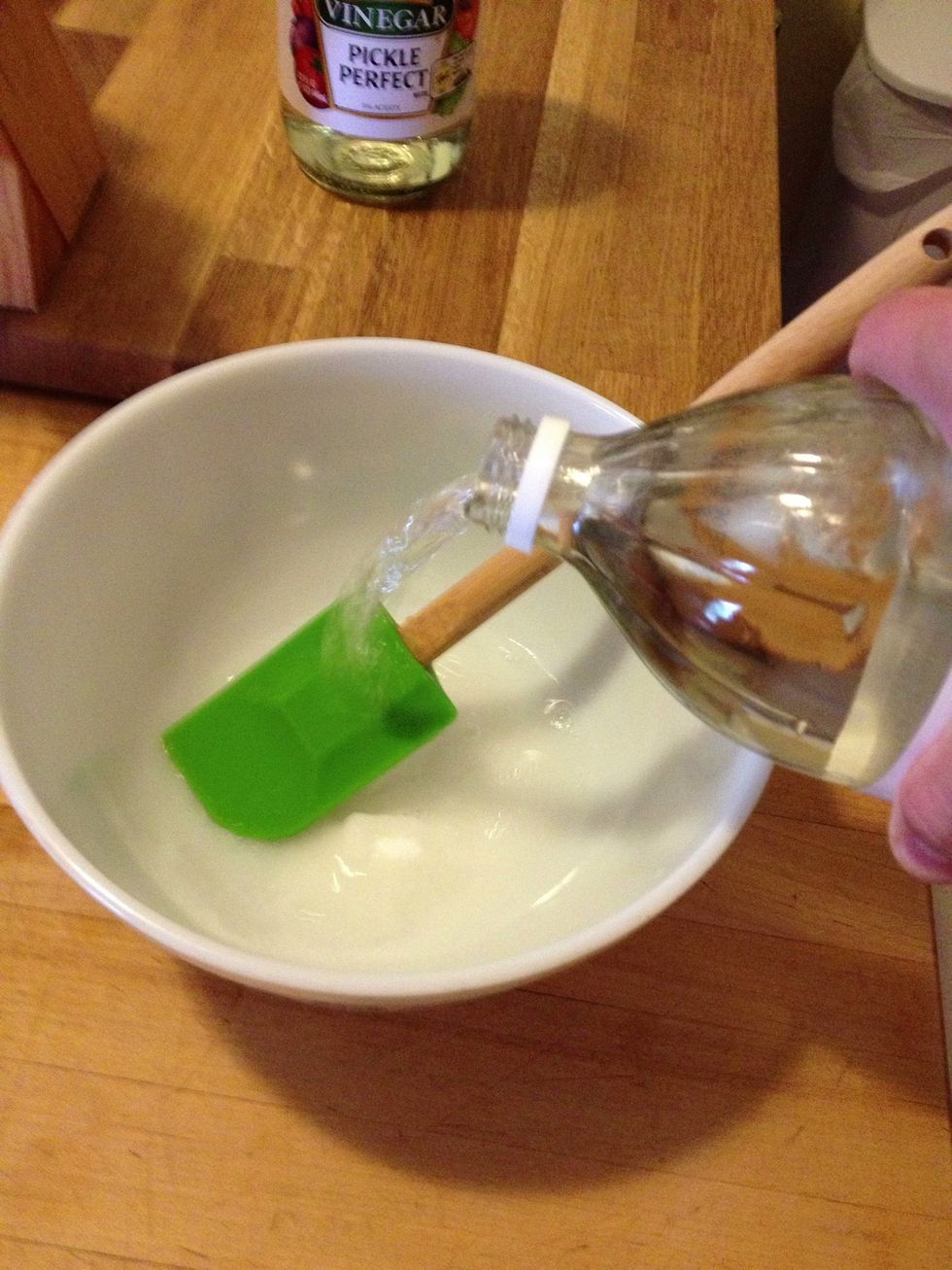 Pour your vinegar in while you stir. Then add water. It is important to taste at this point because you may like your pickles to be a bit sweeter or more sour.