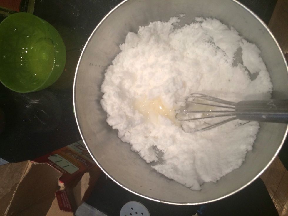 Pour your wet ingredients into your dry ingredient bowl and start mixing immediately.