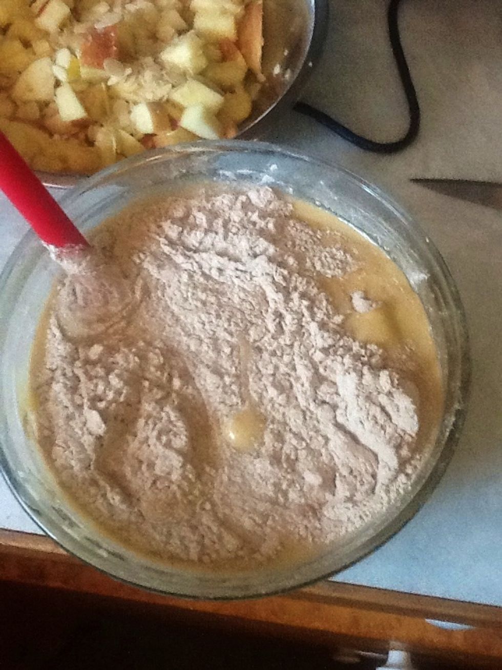 Pour your wet mix onto your flour mix. Use your biggest bowl for this since its a lot to mix all together.