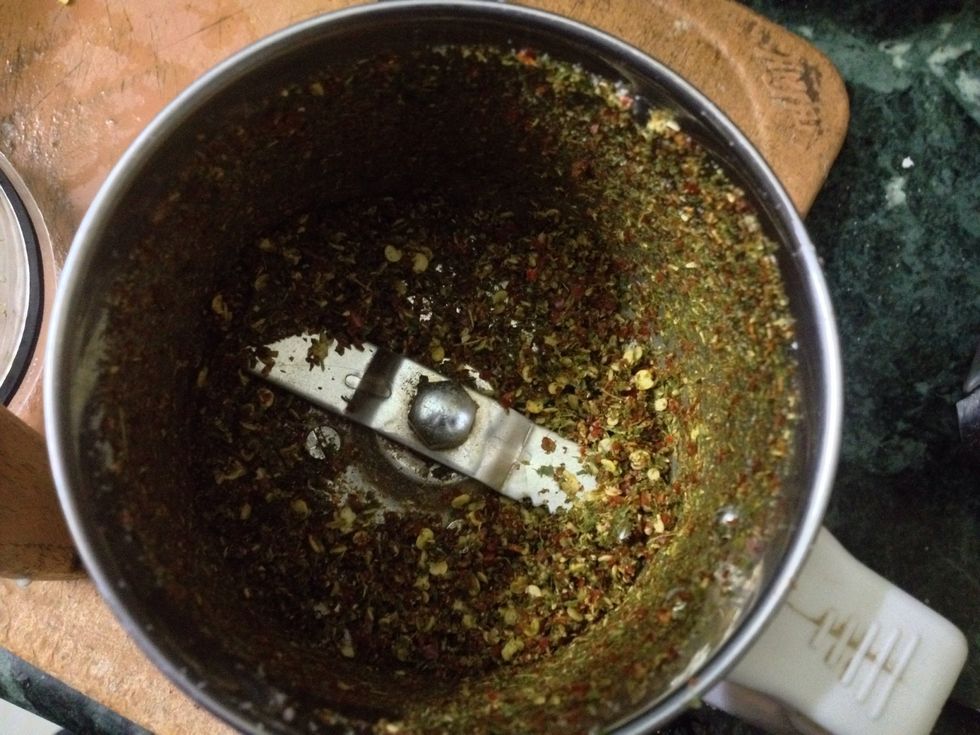 Powder of turmeric, red chilli and Curry leaves.